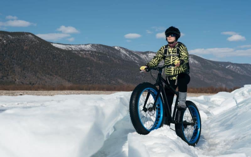 ride fat bike easily over snow, ice